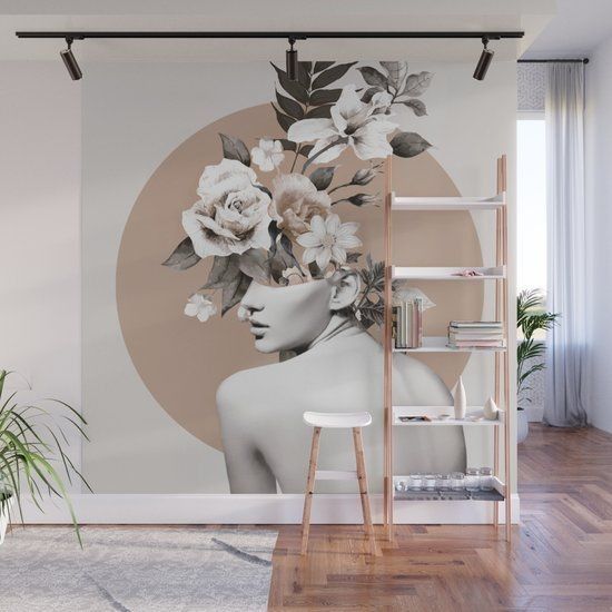 a white mannequin with flowers in front of a beige circle wallpaper mural