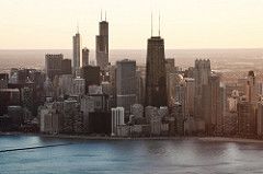 an aerial view of a large city with tall buildings