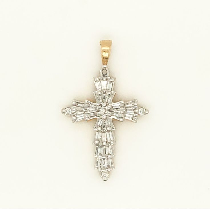 Baguette Cross 14k Yellow Gold, Weighs 1.4 Grams, It Has A 0.18 Carat Total Weight In The Diamonds (Chain Is Not Included) White Baguette Diamond Pendant Jewelry, Timeless White Baguette Jewelry, Timeless White Baguette Diamond Jewelry, Timeless White Jewelry With Baguette Diamonds, White Baguette Fine Jewelry, Elegant Cross Shaped Jewelry With Baguette Diamonds, Elegant Cross Jewelry With Baguette Diamonds, White Baguette Jewelry For Gift, Diamond Cross Necklace