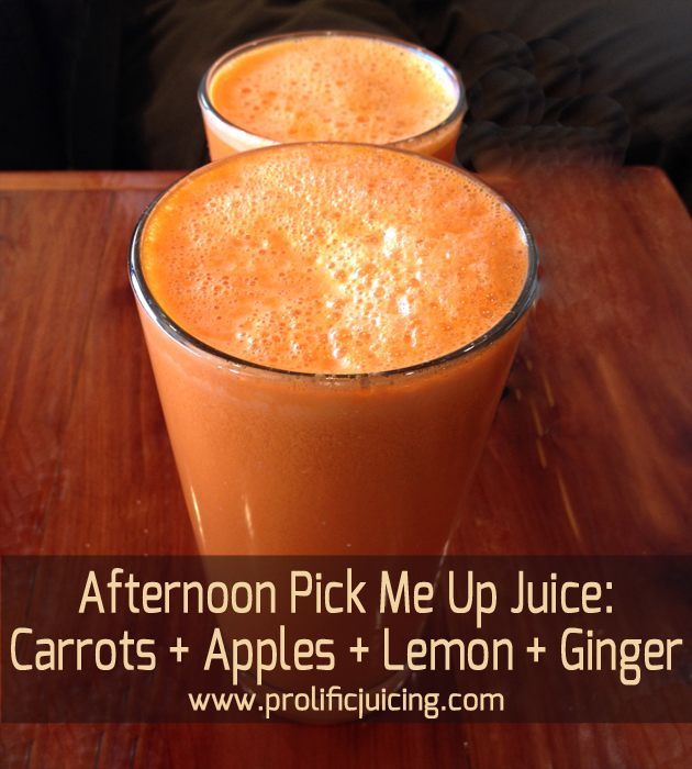 two glasses of carrot juice sitting on top of a wooden table with text overlay reading afternoon pick me up juice carrots + apples + lemon + ginger