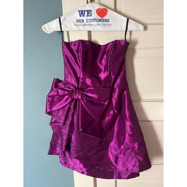 "90s Shimmery Iridescent Purple Mini Strapless Dress with Bow Brand: Jessica McClintock for Gunne Sax Size: 3 Measurements: 55\" Length x 32\" Bust x 30\" Waist Features: Made in USA, boning in chest, bow on waist strapless, tulle layered at the bottom, zip closure Excellent vintage condition; smoke-free environment" Mini Strapless Dress, Iridescent Purple, Jessica Mcclintock, Gunne Sax, Dress With Bow, Dress Clothes For Women, Vintage 90s, Strapless Dress, Dress Outfits