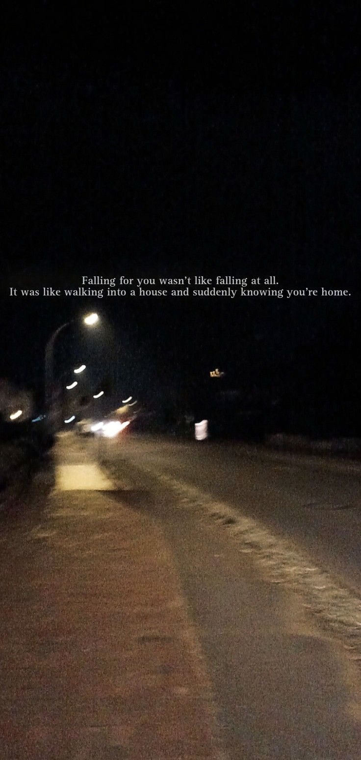 an empty street at night with the words falling for you when the traffic is all