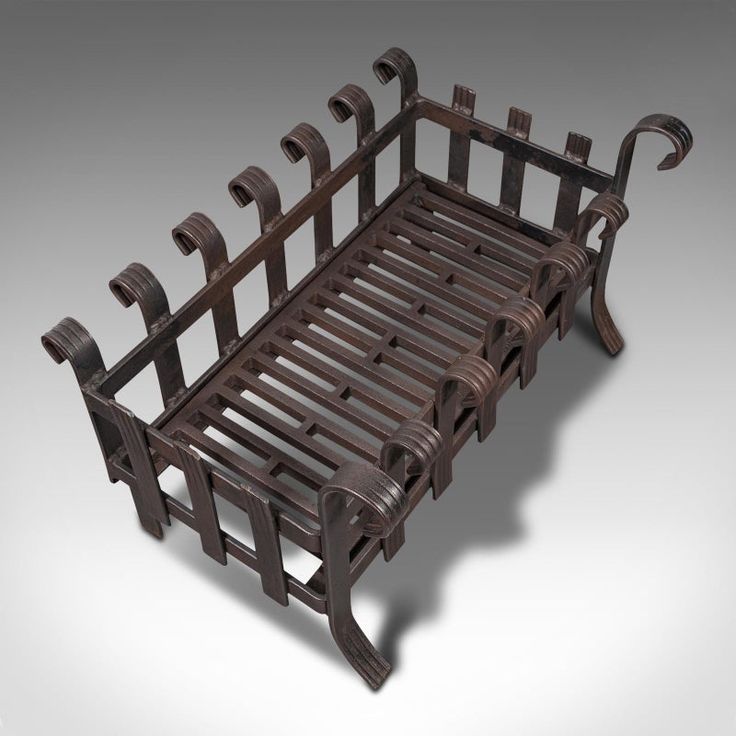 an old wooden bed with four rails on the bottom and one foot in the middle