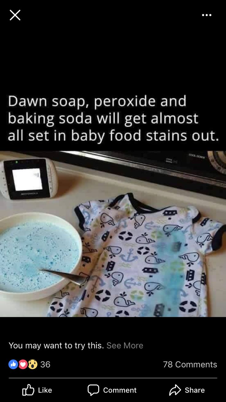 a bowl of food next to a t - shirt and cell phone on a counter