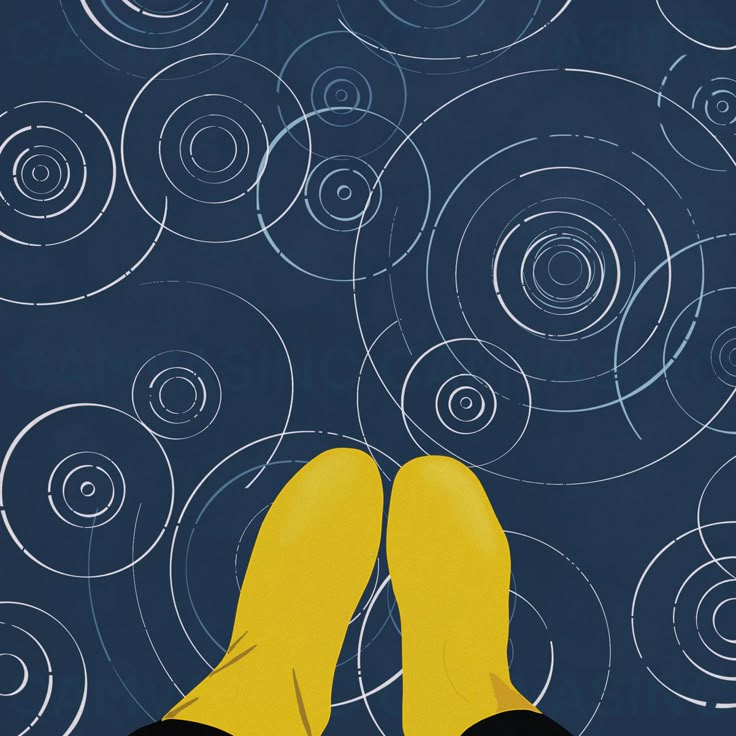 a person's feet in the air with circles around them