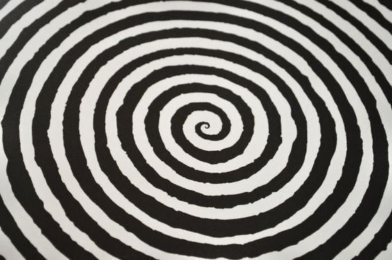 an abstract black and white spiral design