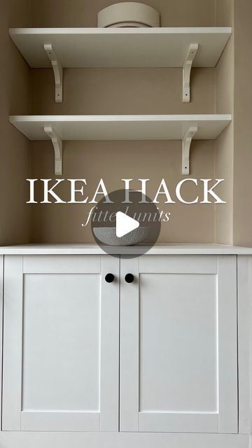 an ikea hack with white cabinets and shelves