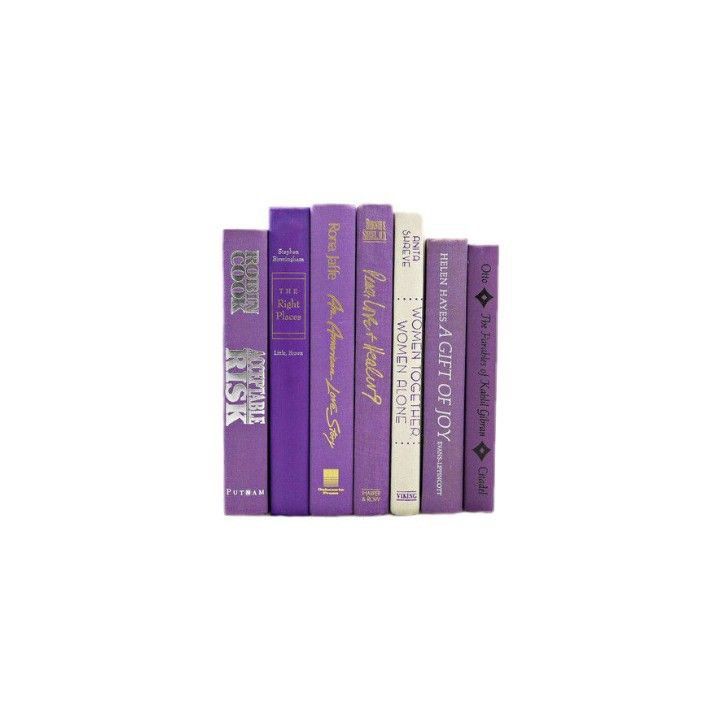 a row of purple books sitting on top of each other