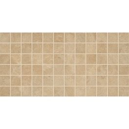 a beige tile wall with squares on it