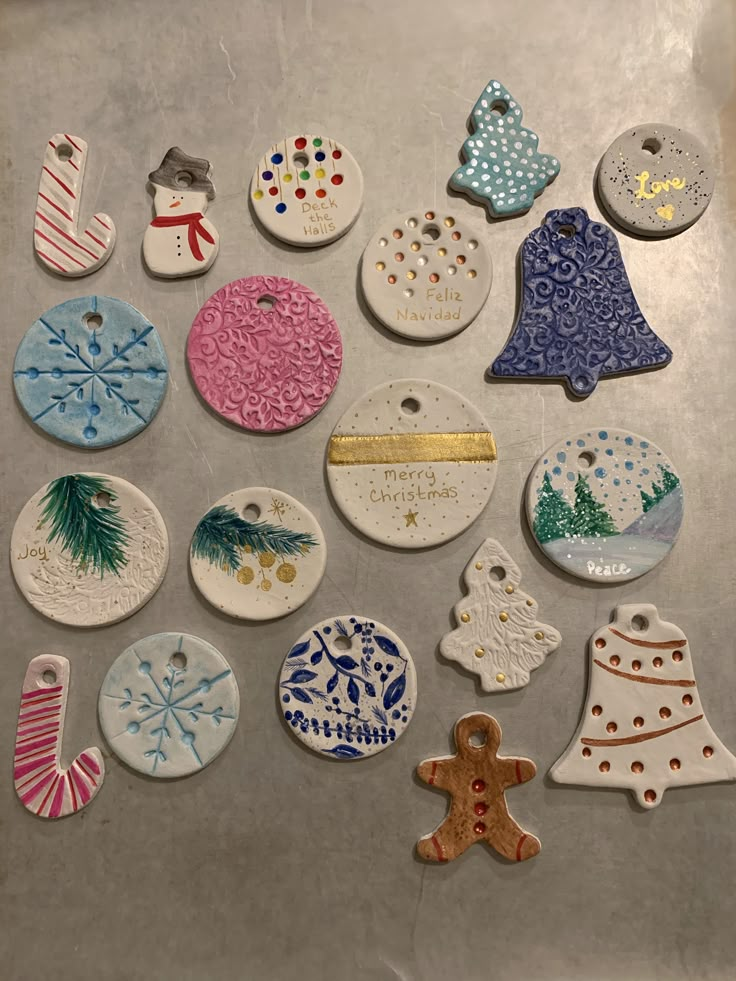 christmas ornaments are displayed on a table