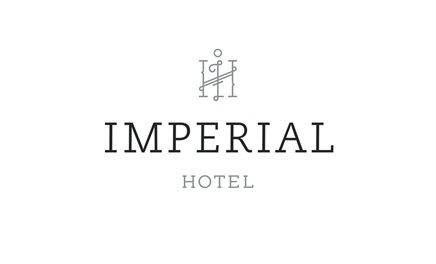 the imperial hotel logo on a white background