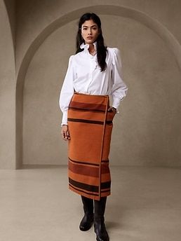 Explore the world in modern-day luxury, inspired by the red rock canyons of the West.  This midi blanket wrap skirt employs a unique blend of extravagant Italian wool fused with sumptuous cotton to create a vintage-inspired aesthetic.  COLUMN FIT: Se Blanket Skirt, Leather Binding, Tweed Pants, Fringe Leather Jacket, I'm Crazy, Professional Wear, Luxury Swimwear, Wool Wrap, Huge Sale