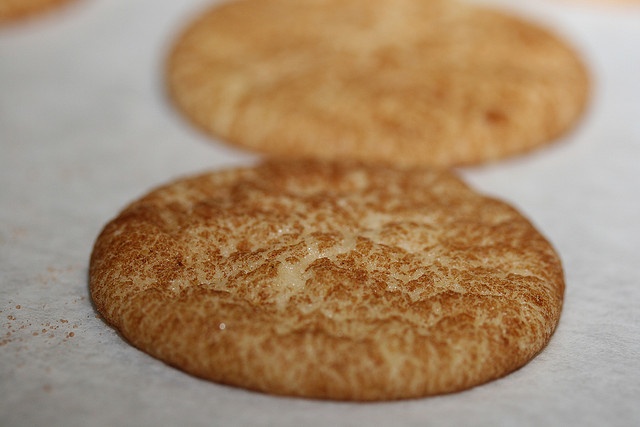 four cookies are sitting on top of a table