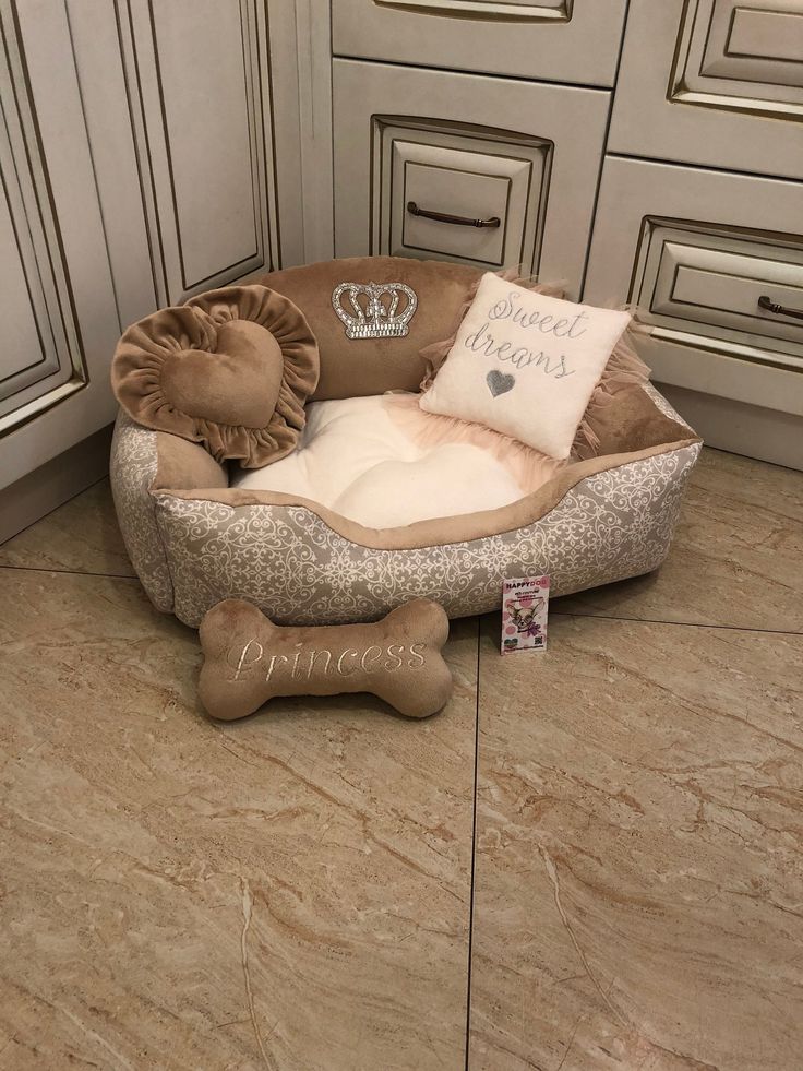 a dog bed that is on the floor