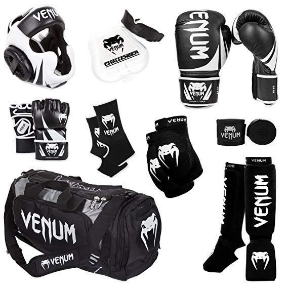 a variety of sports equipment including gloves, pads and mitts are shown in this image