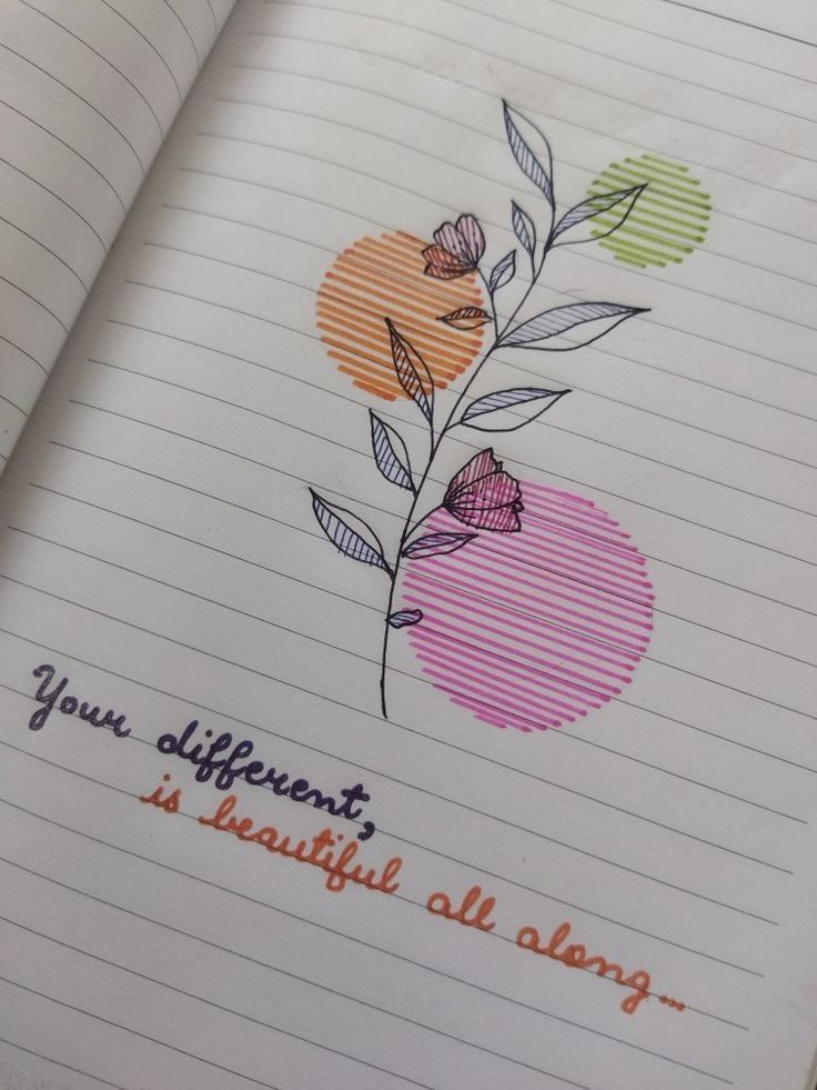 an open notebook with writing on it and flowers drawn on the pages in different colors