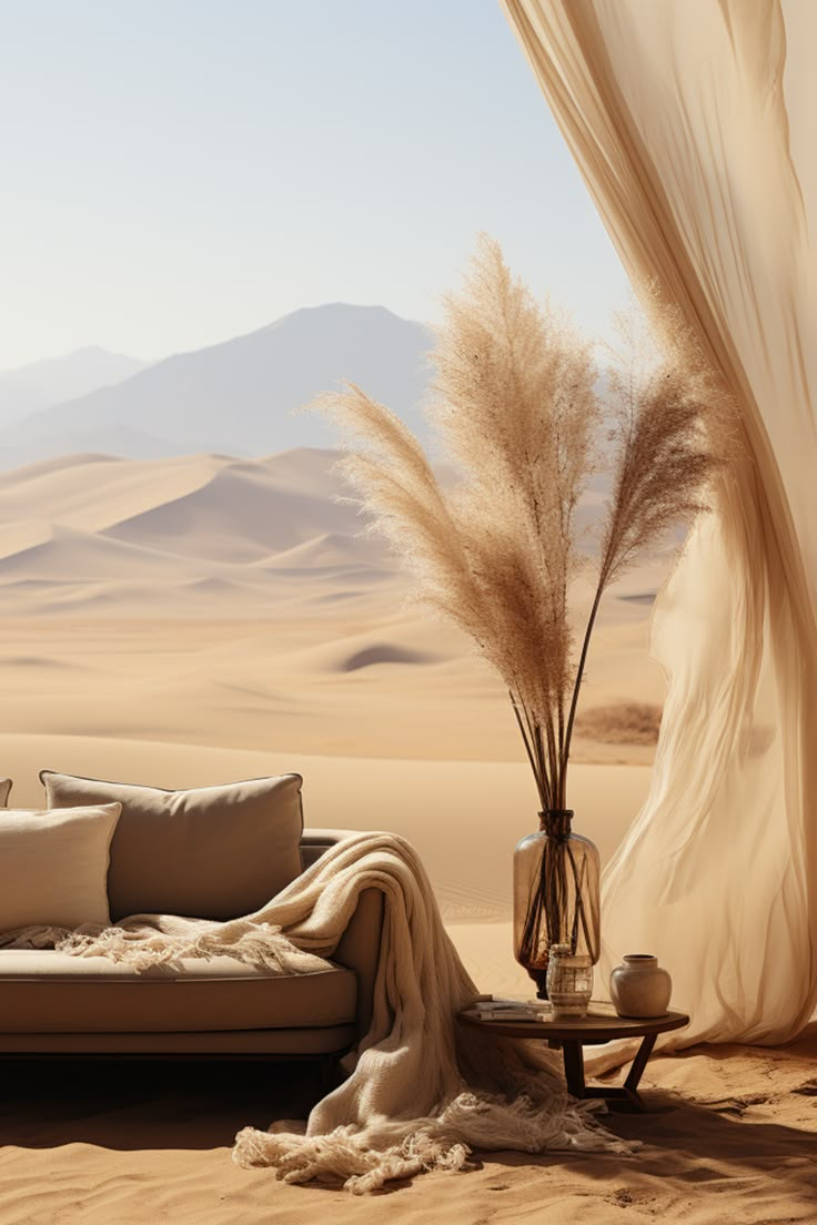 a couch sitting in the middle of a desert