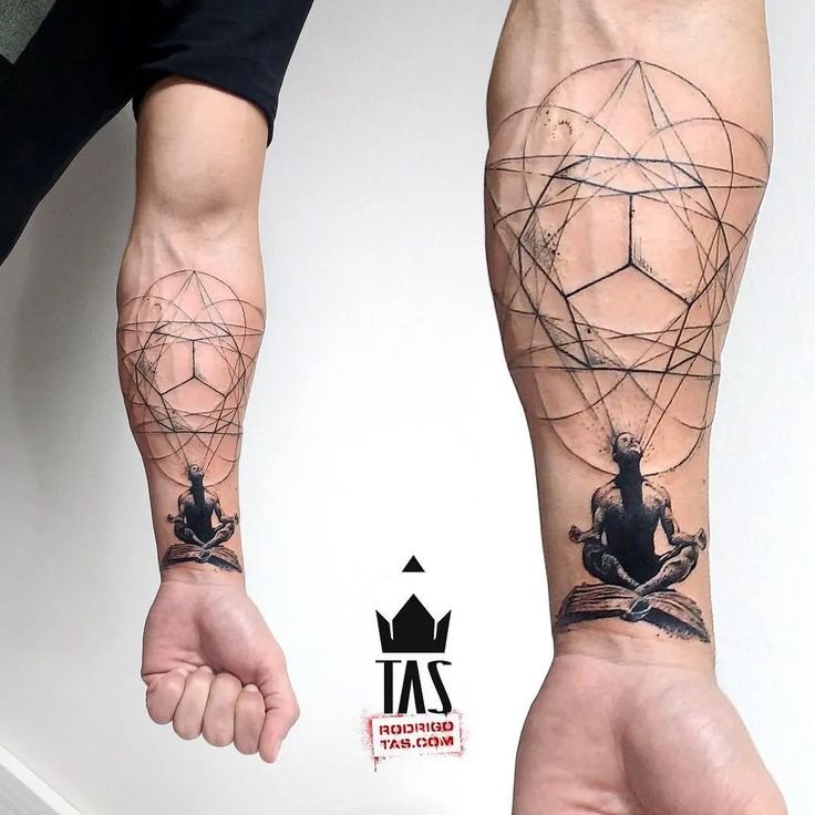 two people with tattoos on their arms and legs, one is holding the other's hand