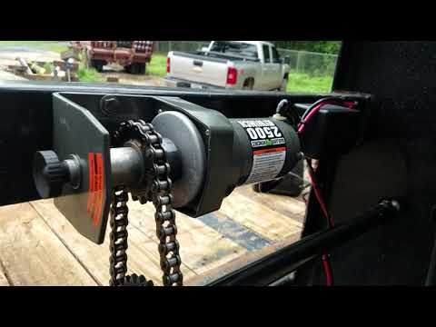 a close up of the front end of a truck with a chain attached to it