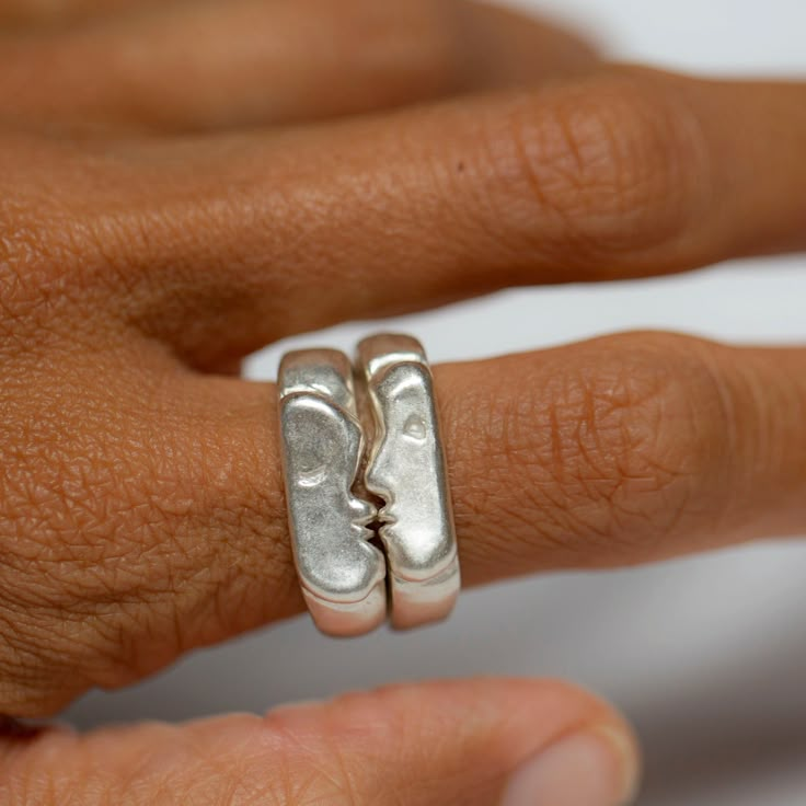 Oxbow's signature Kiss Rings come as a set of two. You can select two of the same size if you intend to wear them together, or choose two different sizes if you want to gift one or wear them on different fingers. Ring one is pictured on the bottom of the first photo & is the face with the nose. Details: Solid sterling silver rings Original design carved in wax and cast Signet style *please note, the kiss rings have a thick band, and most people prefer to size up by 1/2 size. This is just a note, Wax Carved Ring, Cast Rings, Wire Jewelry Rings, Wax Ring, Thick Ring, Silver Ring Designs, Wax Carving, Carved Ring, Rings Silver