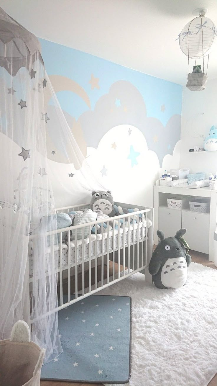 a baby's room with a crib, bed and rug