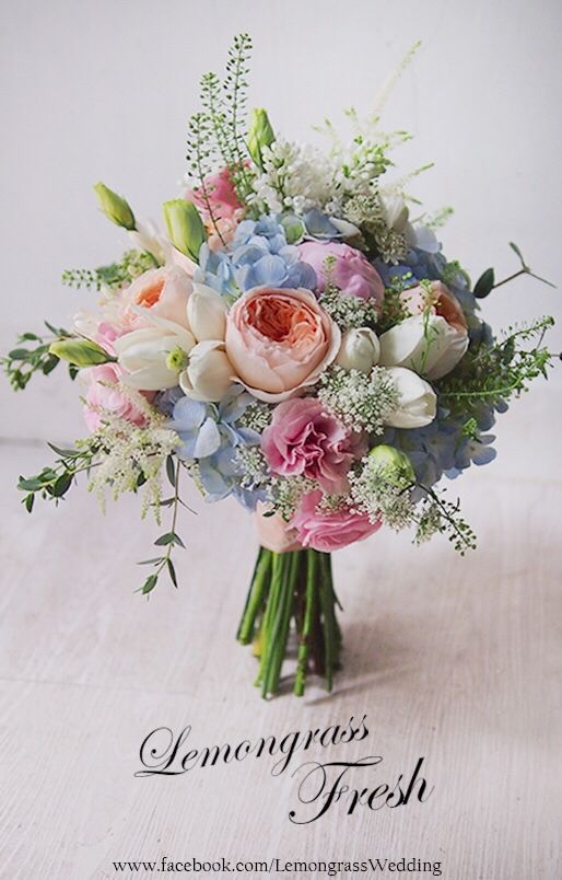 a bouquet of flowers sitting on top of a table