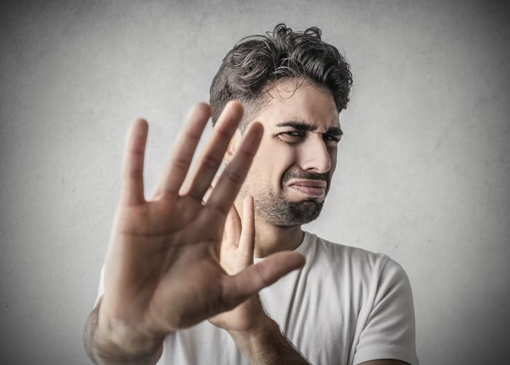 a man making the vulcan sign with his hand