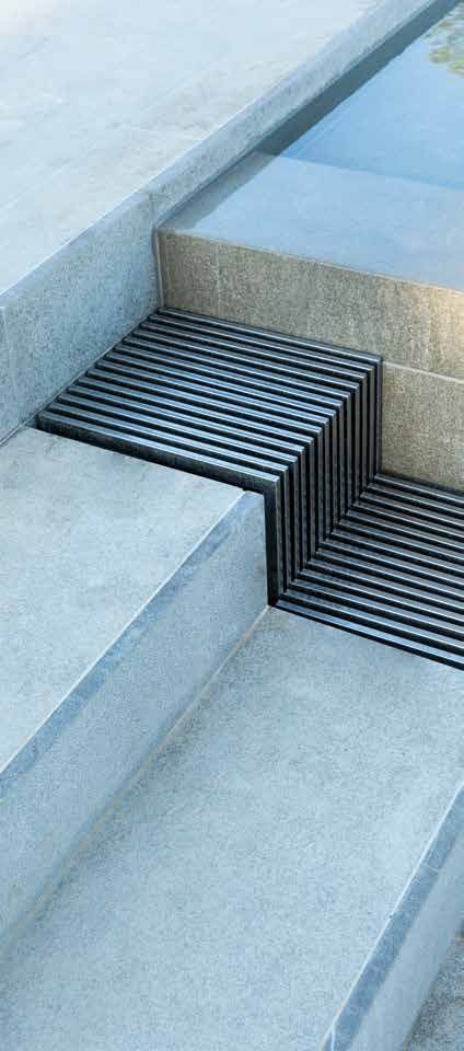 the steps are made out of concrete and metal