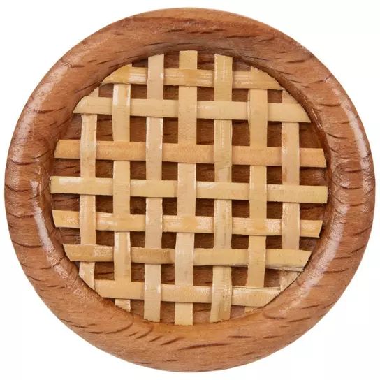 a close up of a wooden bowl with weaved design on the bottom and sides