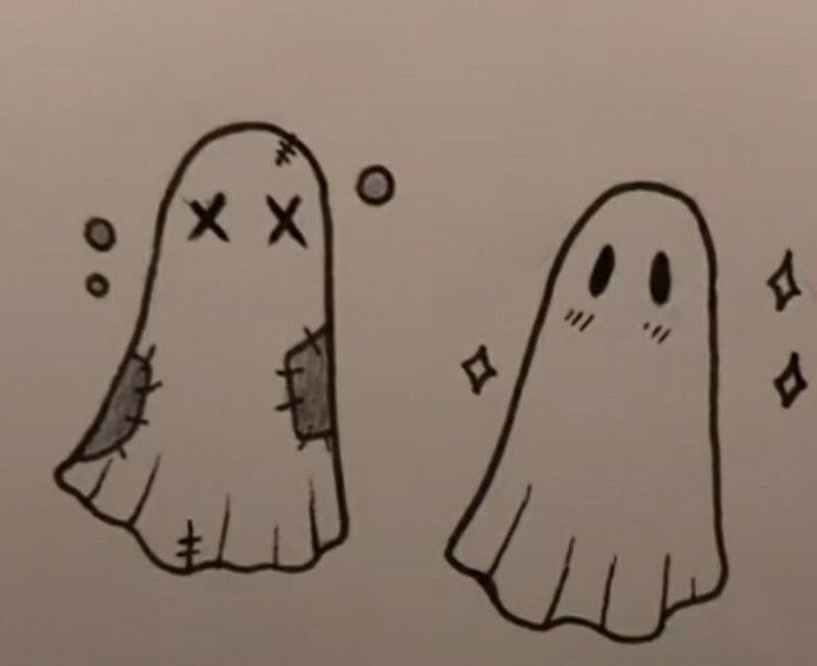 two cartoon ghost like objects with crosses on them