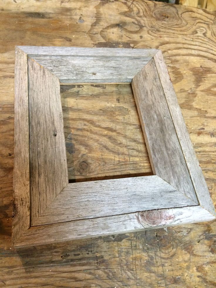 a wooden frame sitting on top of a table