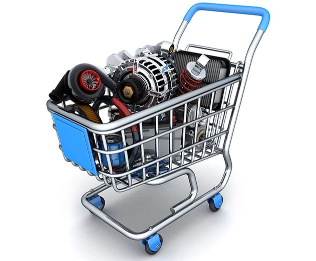 a shopping cart filled with different types of engine parts in it's front basket