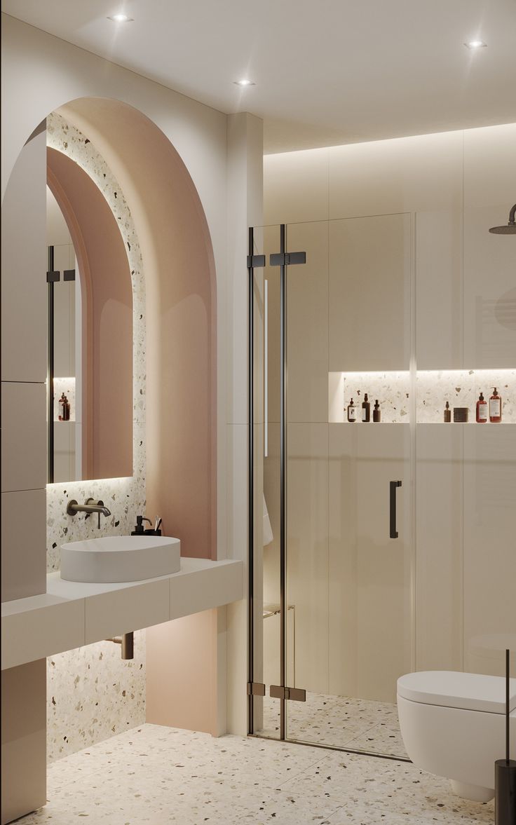 a bathroom with a sink, toilet and bathtub next to a wall mounted mirror