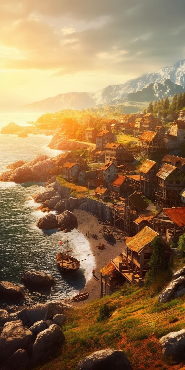 an aerial view of a small village by the ocean with mountains in the background at sunset