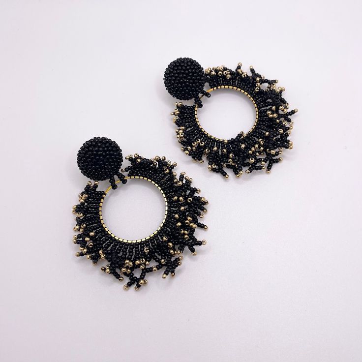 - Ships in 1 business day  - 100% Handmade  - Seed Beads, Gold Filled  - Measure: 2.75 inches  - Weight: 0.8 ounce (24 grams) Classic Black Round Beaded Jewelry, Traditional Black Beaded Earrings With Round Beads, Playful Black Round Beaded Jewelry, Black Beaded Hoop Earrings For Party, Black Beaded Tassel Earrings With Round Beads, Elegant Black Round Bead Earrings, Black Round Earrings With Dangling Beads, Black Metal Round Beads Earrings, Elegant Black Tassel Earrings With Round Beads