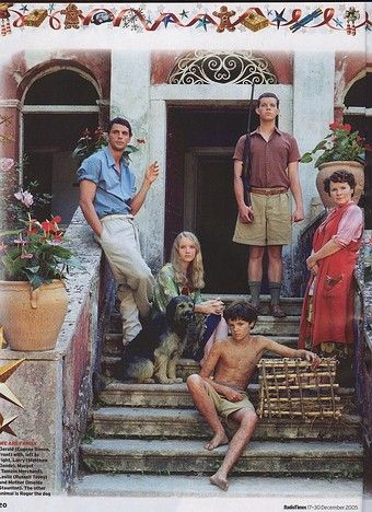 a group of people standing on the steps of a building