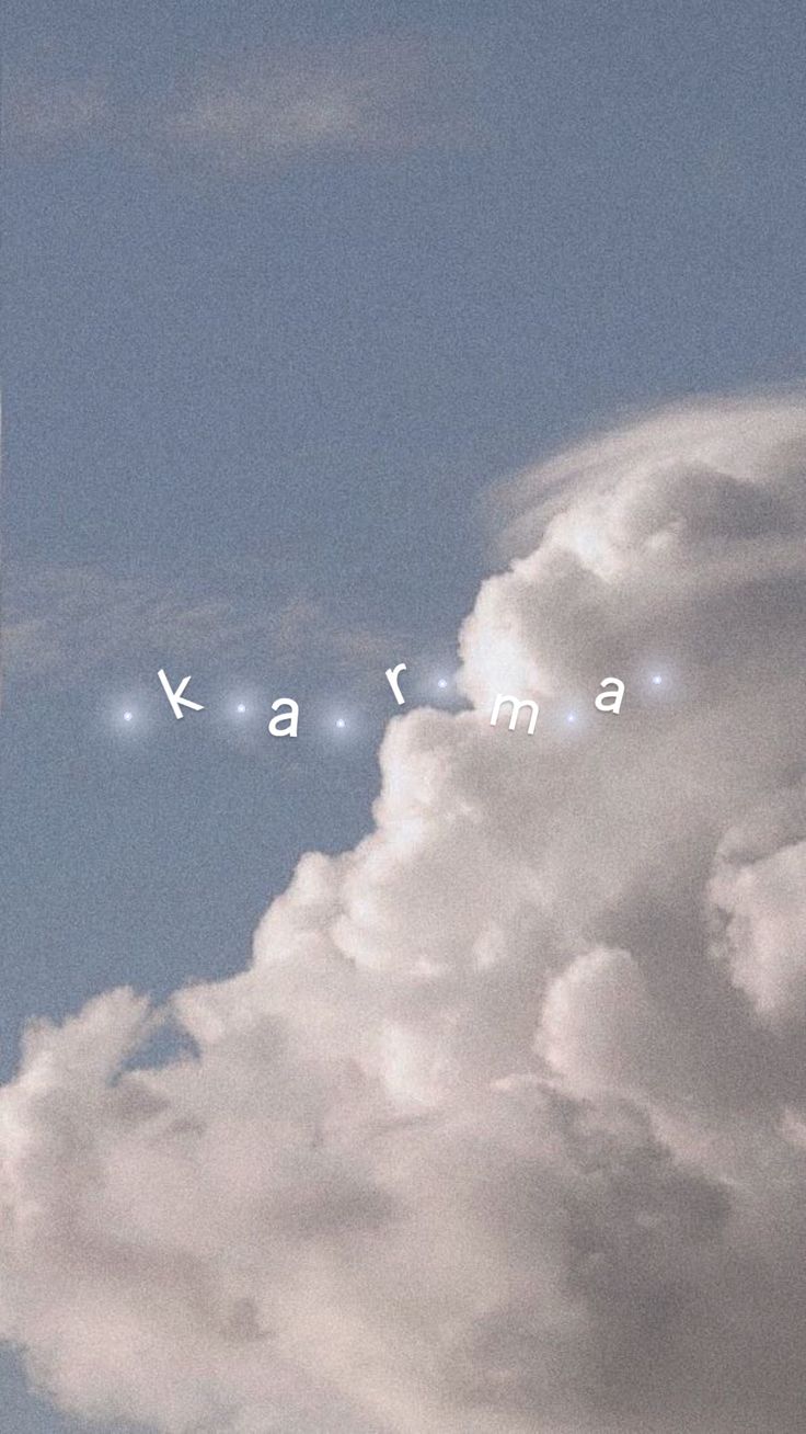 an airplane is flying in the sky with words written on it that spell out karmima