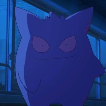 an evil looking cat with big eyes standing in front of a window at night time