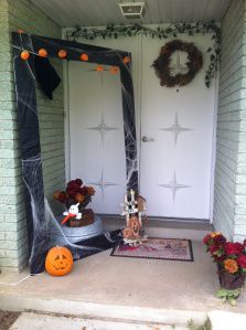 halloween decorations on the front door of a house