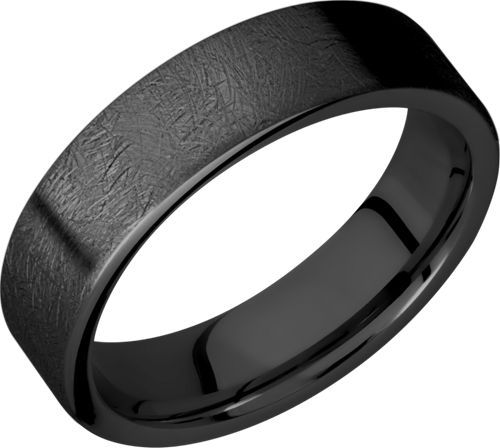 black ceramic wedding ring with an etched pattern in the center and matt finish on the outside