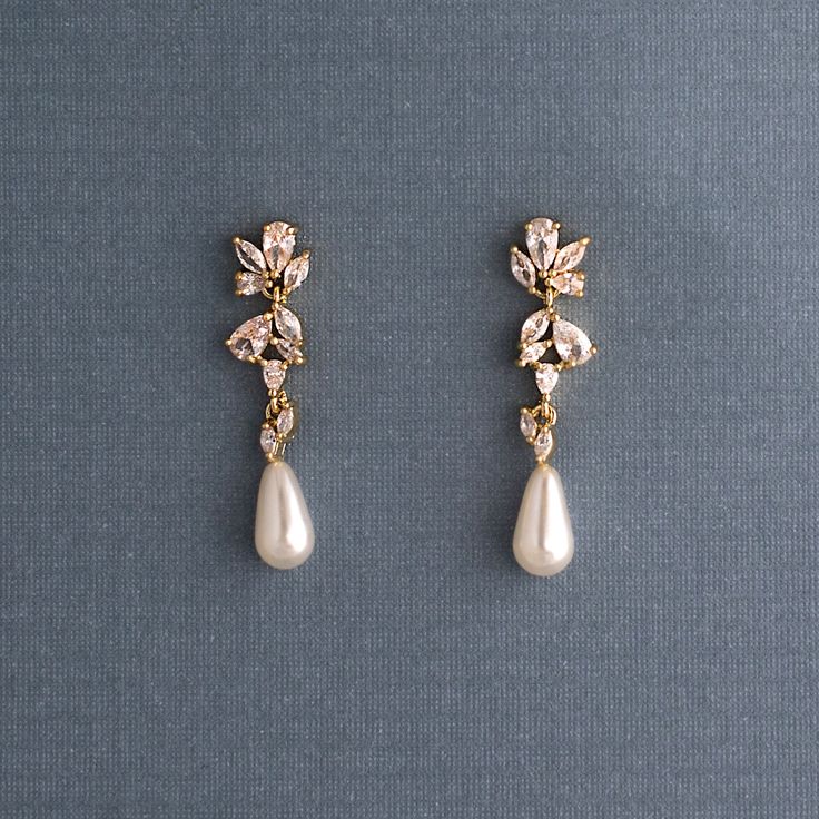 A single ivory teardrop pearl hangs from a delicate cluster of CZ jewels. These wedding day earrings are delightfully elegant. They are about 1.25 inches long and .25 inches wide, lead and nickel free, grade AAA CZ stones. Nose Piercing Gold, Aesthetic Silver Jewelry, Wedding Day Earrings, Jewelry Lookbook, Cz Earrings, Fancy Jewelry, Girly Jewelry, Dream Jewelry, Stylish Jewelry