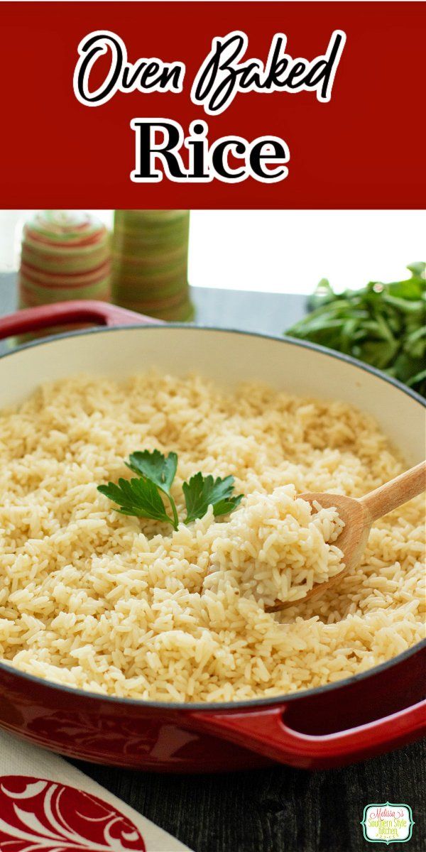 a red pan filled with rice and garnished with parsley