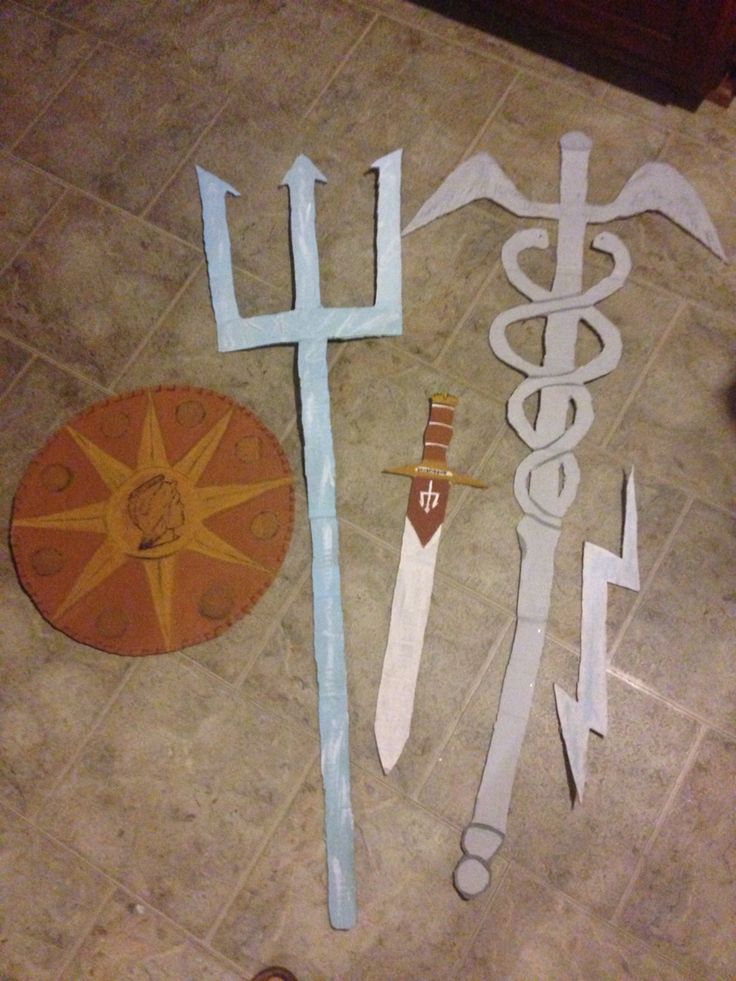 several different types of swords on the floor