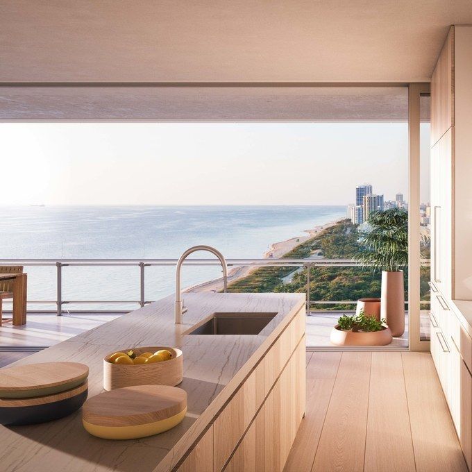 a kitchen with an ocean view is shown