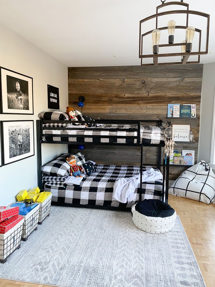 a bedroom with bunk beds and pictures on the wall above it, along with other items