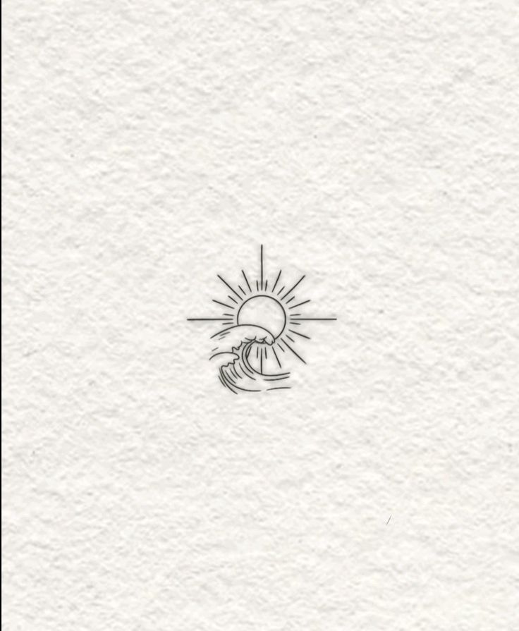 a white paper with a black and white drawing of a sun on the top of it