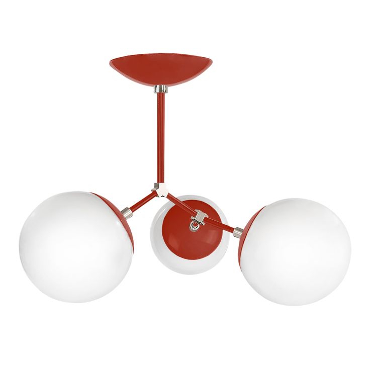 three red and white lights hanging from a ceiling fixture with one light on the other side