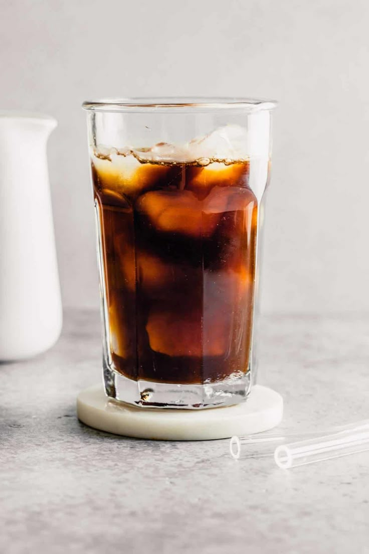 an iced drink in a glass with ice