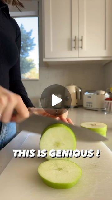 a woman cutting up some cucumbers on top of a kitchen counter with the caption, this is genius