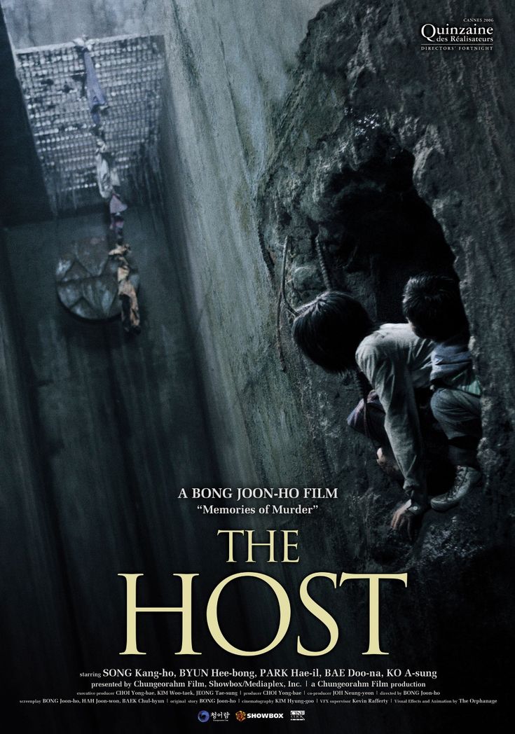 the host movie poster with two people climbing out of a tunnel